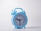 blue plastic alarm clock with large Arabic numerals on a white background