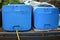 Blue plastic barrels for drinking water, liquid storage tanks