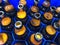 Blue plastic honeycombs shaped case  with full brown glass beer bottles. Horizontal  image