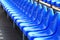 Blue plastic seat in street scene