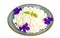 Blue plate with granulated cottage cheese.