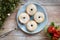 Blue plate with mince pies, fork and christmas decorations