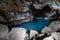 Blue pool in Grjotagja lava cave and fissure in Myvatn, Iceland.