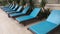 Blue poolside loungers