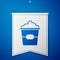 Blue Popcorn in cardboard box icon isolated on blue background. Popcorn bucket box. White pennant template. Vector