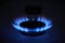 Blue propane gas flame. Burning gas. Kitchen stove burner. Natural gas market concept image with copyspace