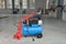 Blue pump compressor for washing cars, indoor. Cleaning concept.