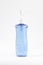 Blue pump head bottle of instant antiseptic hand sanitizer transparent gel isolated on white background, no label. Antibacterial,