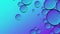 Blue purple oil droplets abstract background. Organic texture of oil bubbles in water seamless loop.