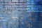 Blue and purple painted brick wall background
