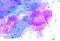 Blue and purple spots and specks on a white background. Abstract watercolor background.