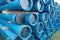 Blue PVC plastic pipes and fittings used for underground water supply and sewer lines