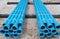 Blue PVC plastic pipes and fittings used for underground water supply and sewer lines