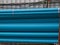 Blue PVC tubes in storage, Plastic tubes