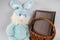 Blue rabbit and wicker basket. Soft toy blue. Photo album. Easter. little bunny and an album