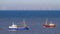 A blue and a red cutter on the North Sea