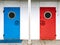 Blue and red entrance doors with round windows