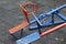 Blue and red horse shaped seesaws