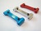 Blue, red , silver aluminum parts on a white background ,CNC parts