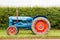 A blue and red vintage fordson major tractor