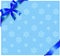 Blue ribbon on winter background