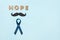 Blue ribbons with mustache and word hope. Prostate Cancer Awareness. Men health awareness. Movember concept