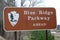 Blue ridge parkway sign on the road in North Carolina mountains