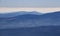 Blue ridges of Low Tatra from Lomnicky peak, High Tatra