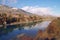 Blue river disappearing into the distance