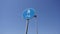 Blue road sign pedestrian and cycle path against blue sky