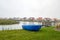 Blue rowboat on the lake on vacation