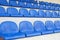 Blue rows of seats in a sports hall. Stadium seating. Empty rows of chairs, seats in the concert hall, in the sports hall