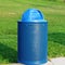 Blue rubbish bin in park