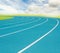 Blue running track and white split line
