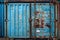 blue rusted metal door of old container generative AI