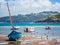 Blue Sailboat On The Beach During Low Tide