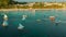 Blue sailboats on the island of Boracay in the evening.