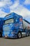 Blue Scania Truck, Detail with Blue Sky and Clouds