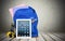 Blue School Backpack with tablet and earphones on