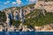 Blue sea and the characteristic caves of Cala Luna, a beach in the Golfo di Orosei, Sardinia, Italy. Big sea caves in the