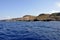 Blue sea and characteristic caves of Cala Luna Golfo di Orosei Sardegna or Sardinia Italy