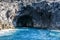 Blue sea and characteristic caves of Cala Luna Golfo di Orosei Sardegna or Sardinia Italy