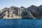 Blue sea and characteristic caves of Cala Luna Golfo di Orosei Sardegna or Sardinia Italy