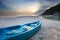 Blue sea kayak on the beach