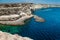 Blue sea lanscape with high stone cliff