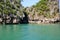 The blue sea, the rock with stalactites, landscape, Panak Island