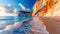 The blue sea, sand and rocks on a beautiful Mediterranean beach