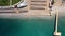 Blue sea and sandy beach. The pier.Holidays, tourism, resort. View from above.