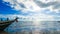 Blue sea and sky sunny day cloudy with wooden boat