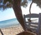 Blue sea, and a traditional chair on island Paros